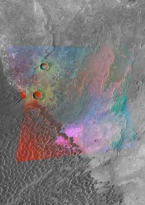 De ruimtesonde Mars Reconnaissance Orbiter werpt een nieuw licht op de diversiteit van de marsbodem. In deze krater tonen de magenta plekken veldspaat, een bestandsdeel van grafiet. Bron: NASA/JPL/JHUAPL/MSSS 