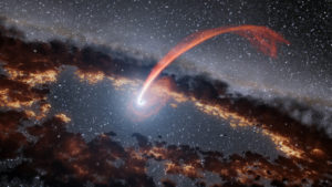 Een ster wordt aan slierten gescheurd door een zwart gat.