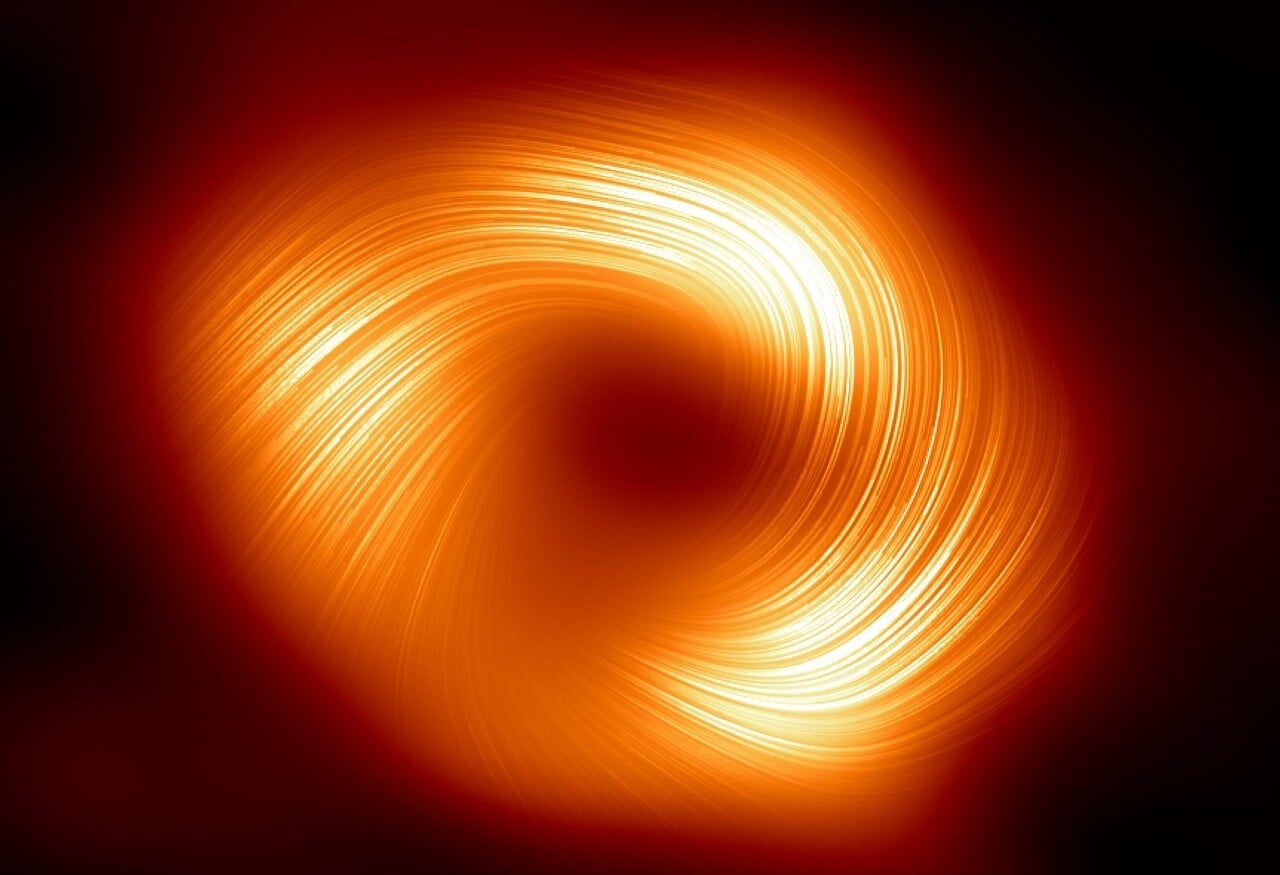 A new image of the black hole at the center of the galaxy reveals a swirling magnetic field